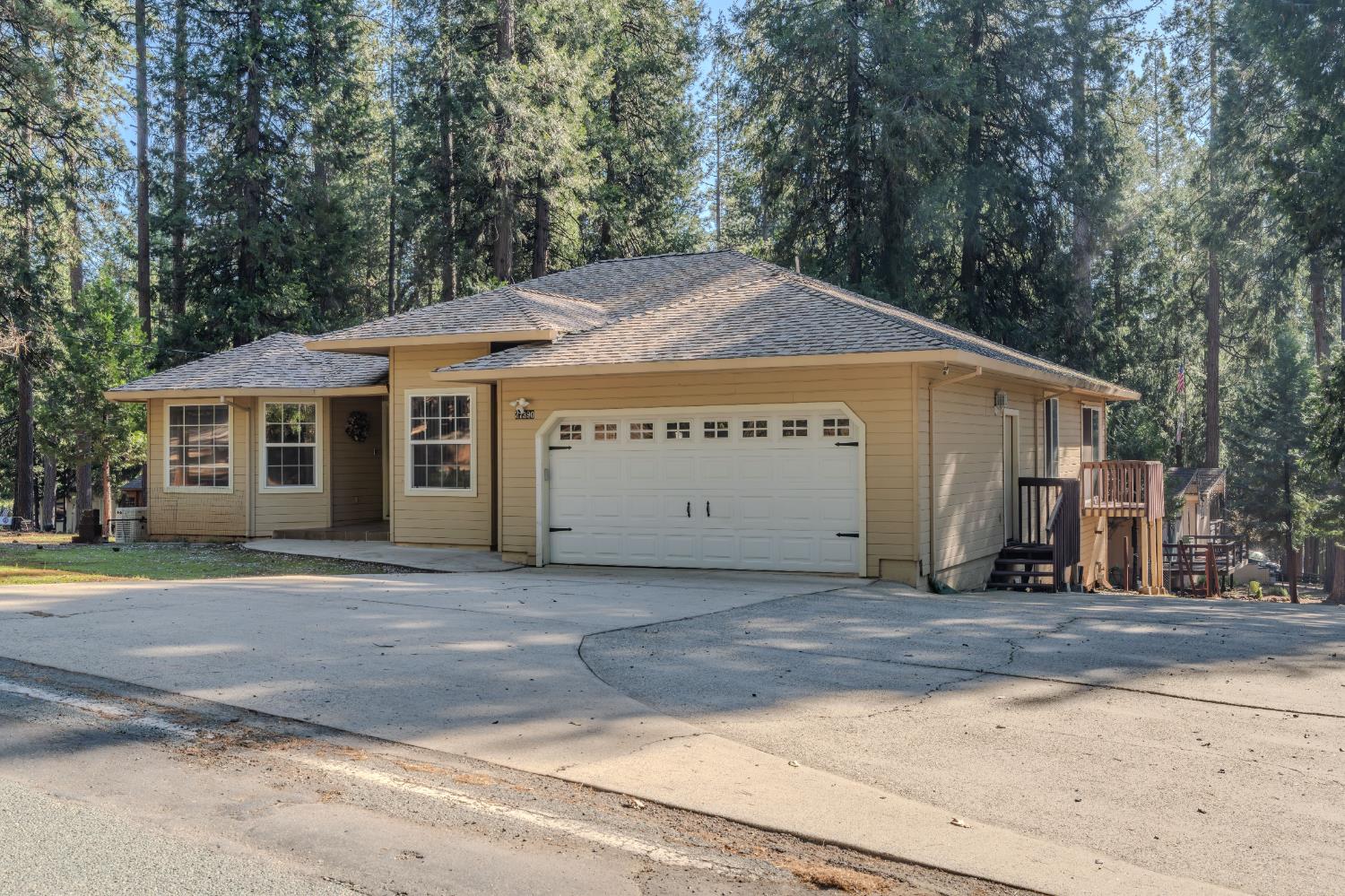 27390 Barton Road Pioneer, CA 95666 - Photo 49 of 52 a sign on the side of a building