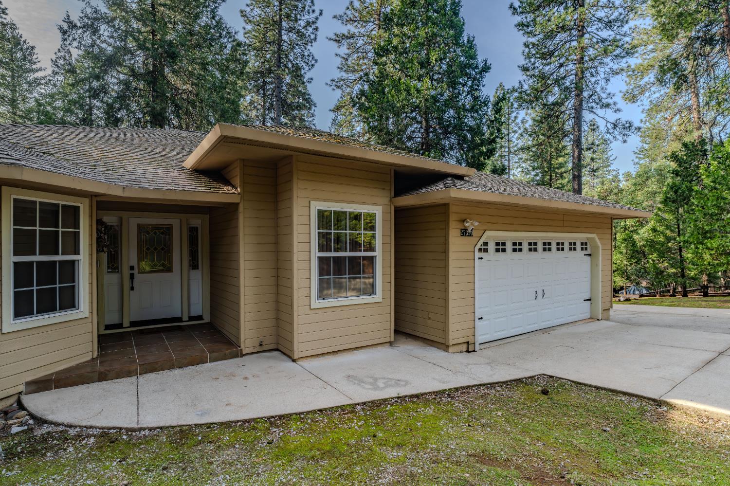27390 Barton Road Pioneer, CA 95666 - Photo 6 of 52 a view of a house with a yard