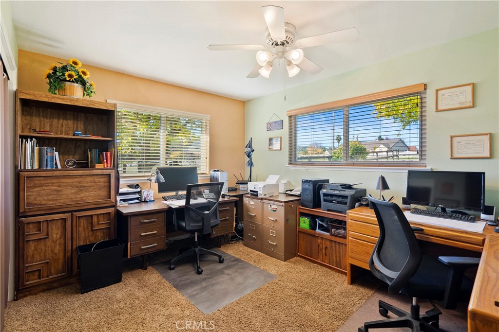 9220 Carmel Road Atascadero, CA 93422 - Photo 20 of 61 Bedroom 3 is at the back of the hallway and is bathed in natural light due to the two windows.