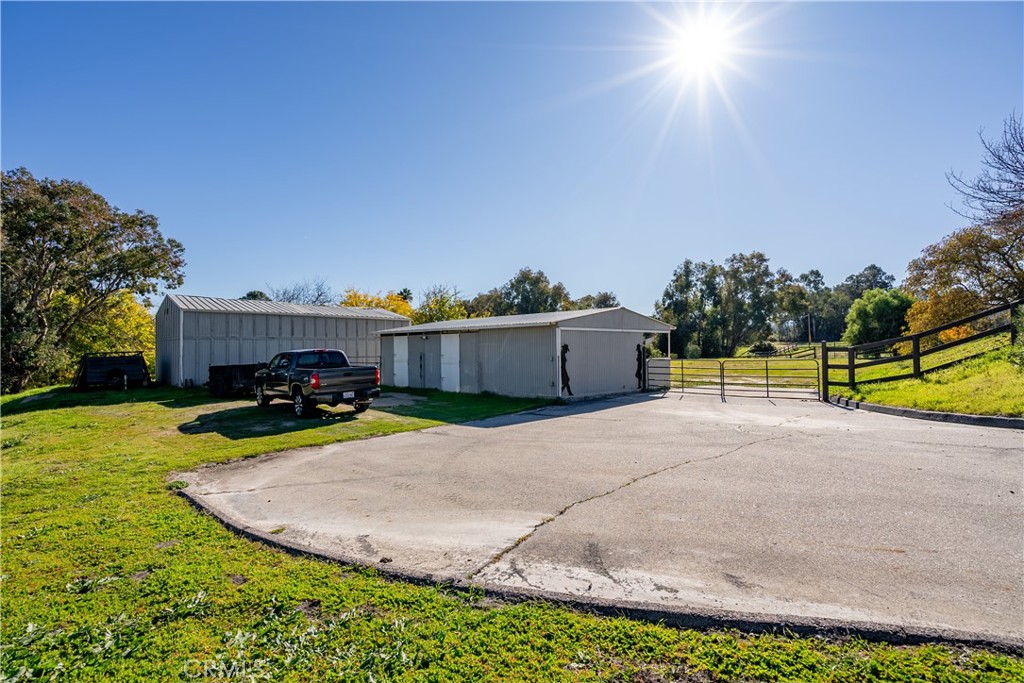 9220 Carmel Road Atascadero, CA 93422 - Photo 44 of 61 The driveway takes us down to the stables and the barn.