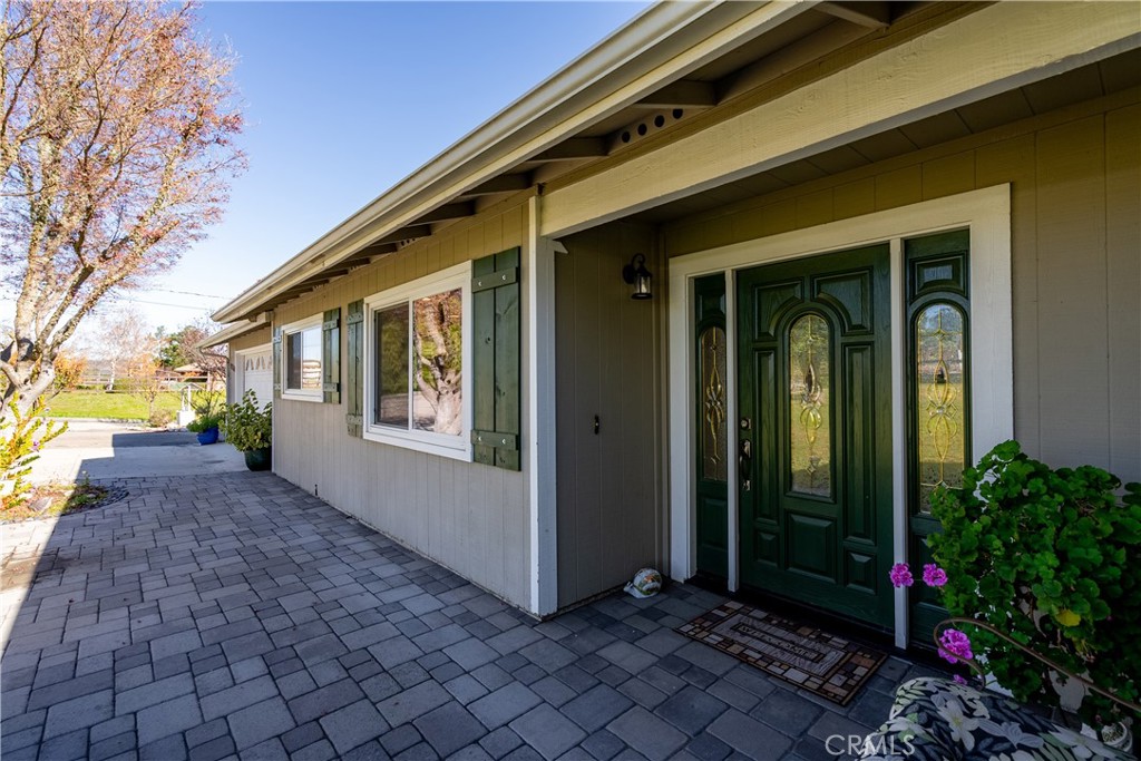9220 Carmel Road Atascadero, CA 93422 - Photo 6 of 61 Brick pavers bring you up to the front door.