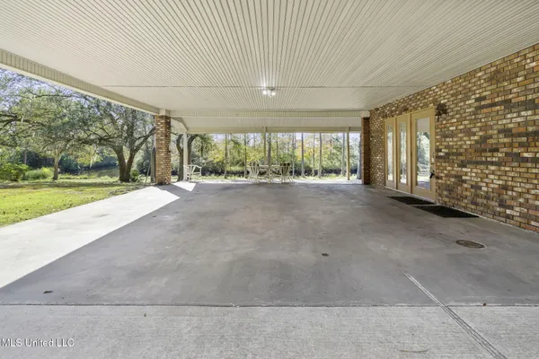 $950,000 | 16100 Bayou Cocoa Point Drive, Kiln, MS 39556