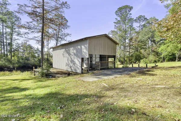 $950,000 | 16100 Bayou Cocoa Point Drive, Kiln, MS 39556