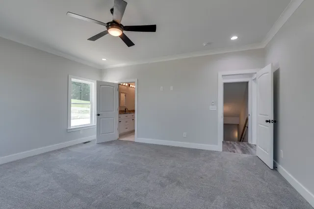 a view of balcony with wooden floor and fence