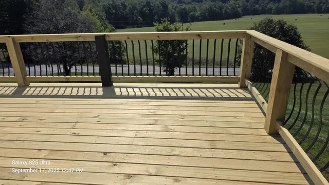 a view of balcony and yard