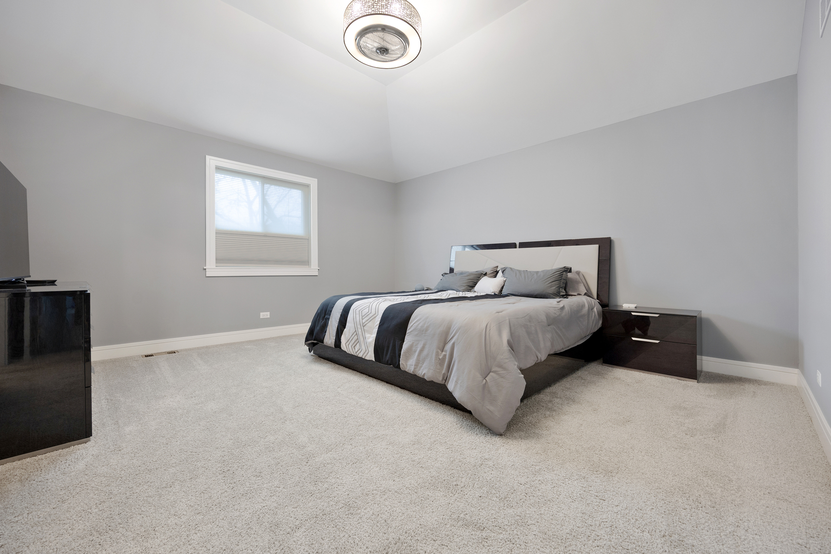 N112 Leonard Street Winfield, IL 60190 - Photo 12 of 26 a bedroom with a bed and a tv