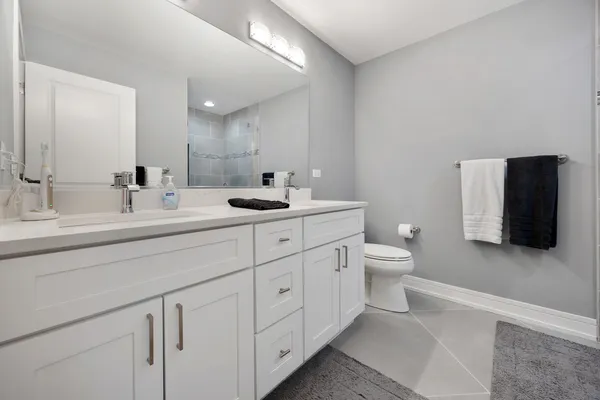 a bathroom with a shower and a bathtub