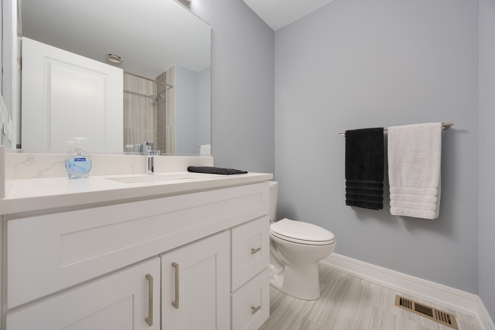 N112 Leonard Street Winfield, IL 60190 - Photo 17 of 26 a bathroom with a sink toilet and a mirror