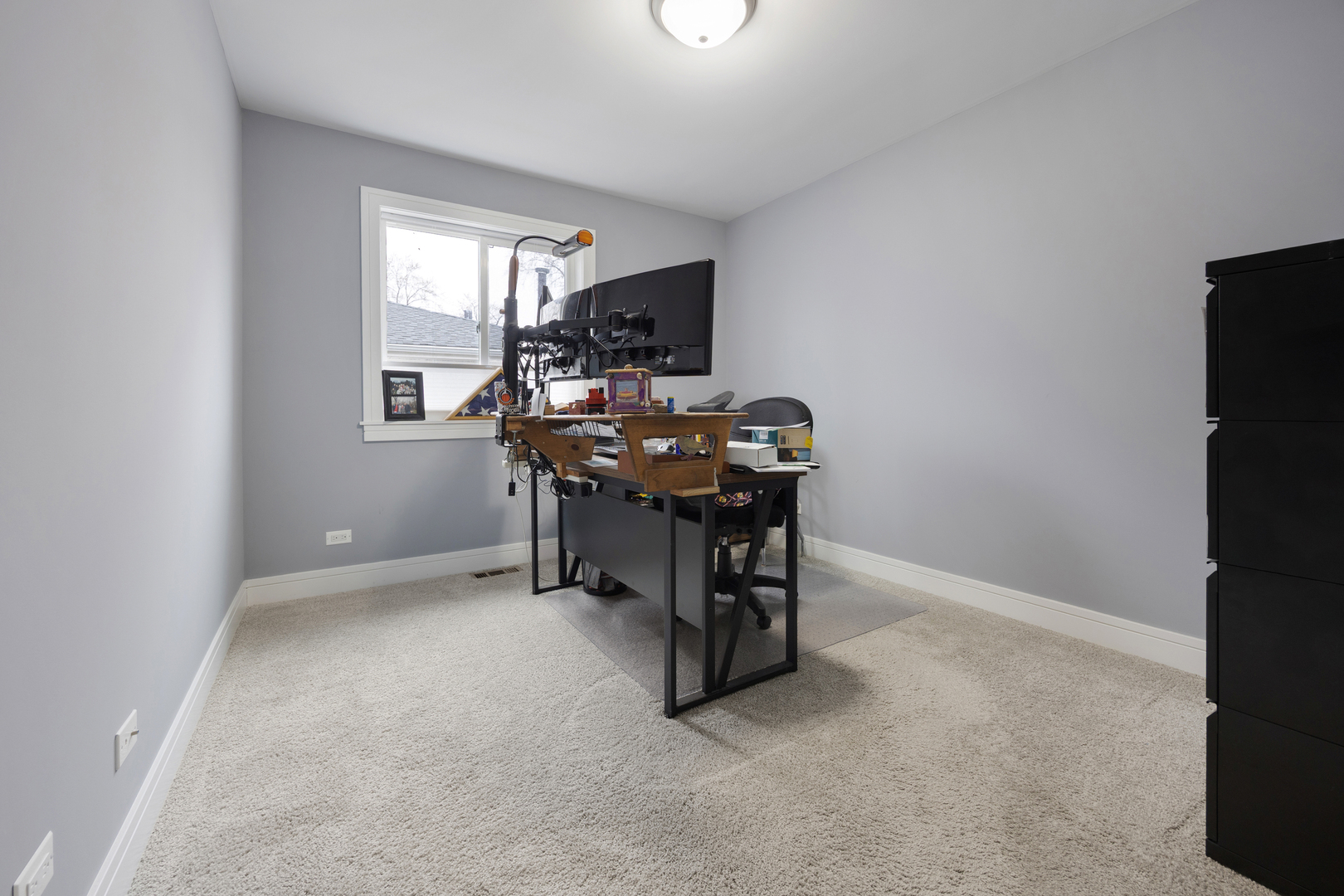 N112 Leonard Street Winfield, IL 60190 - Photo 18 of 26 a view of a workspace with furniture