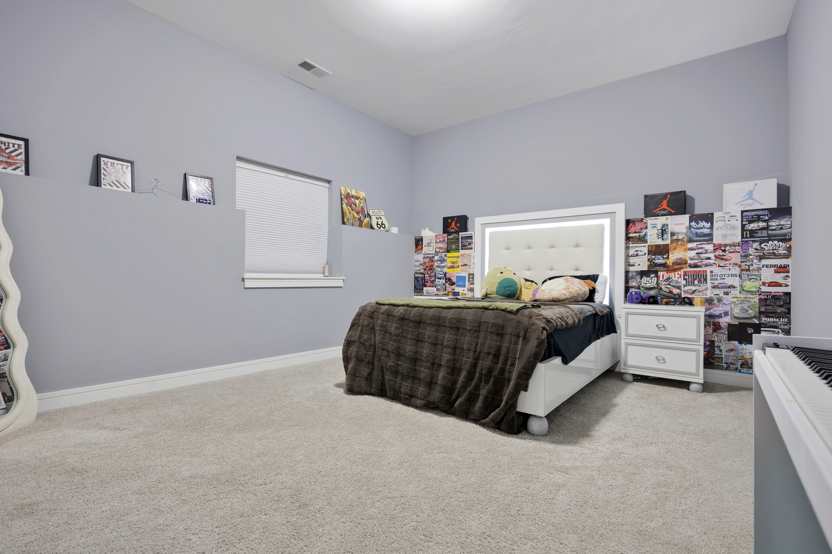 N112 Leonard Street Winfield, IL 60190 - Photo 20 of 26 a bedroom with a bed and a lamp