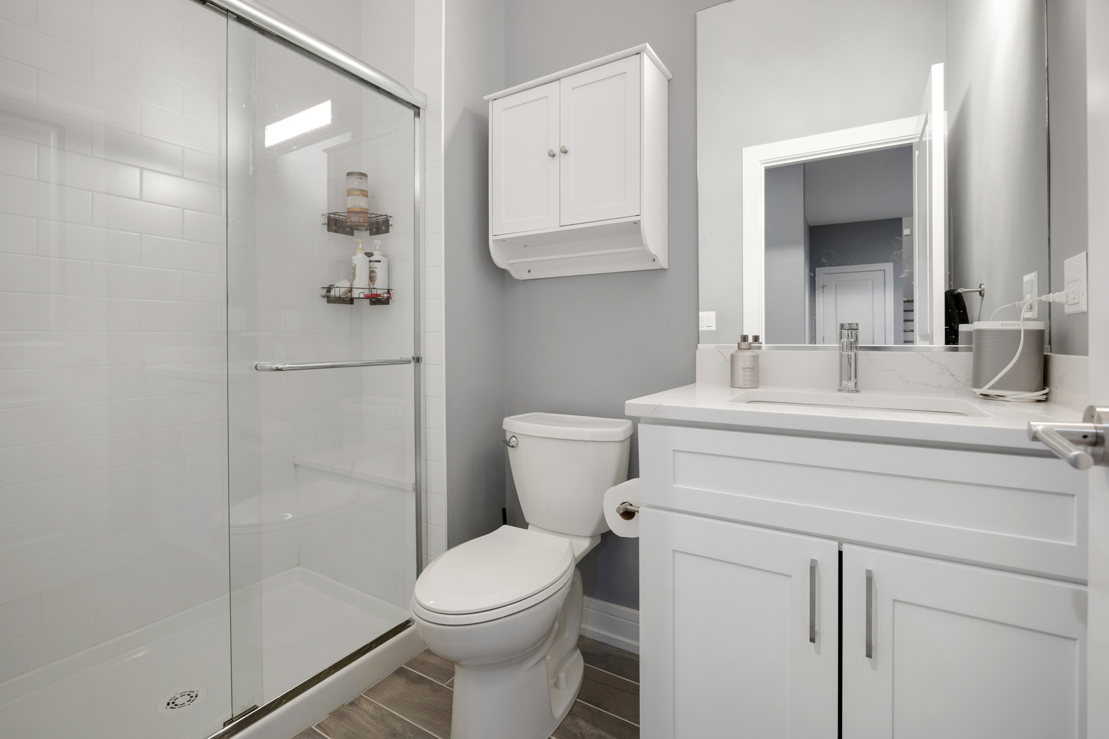 N112 Leonard Street Winfield, IL 60190 - Photo 21 of 26 a bathroom with a sink toilet and shower