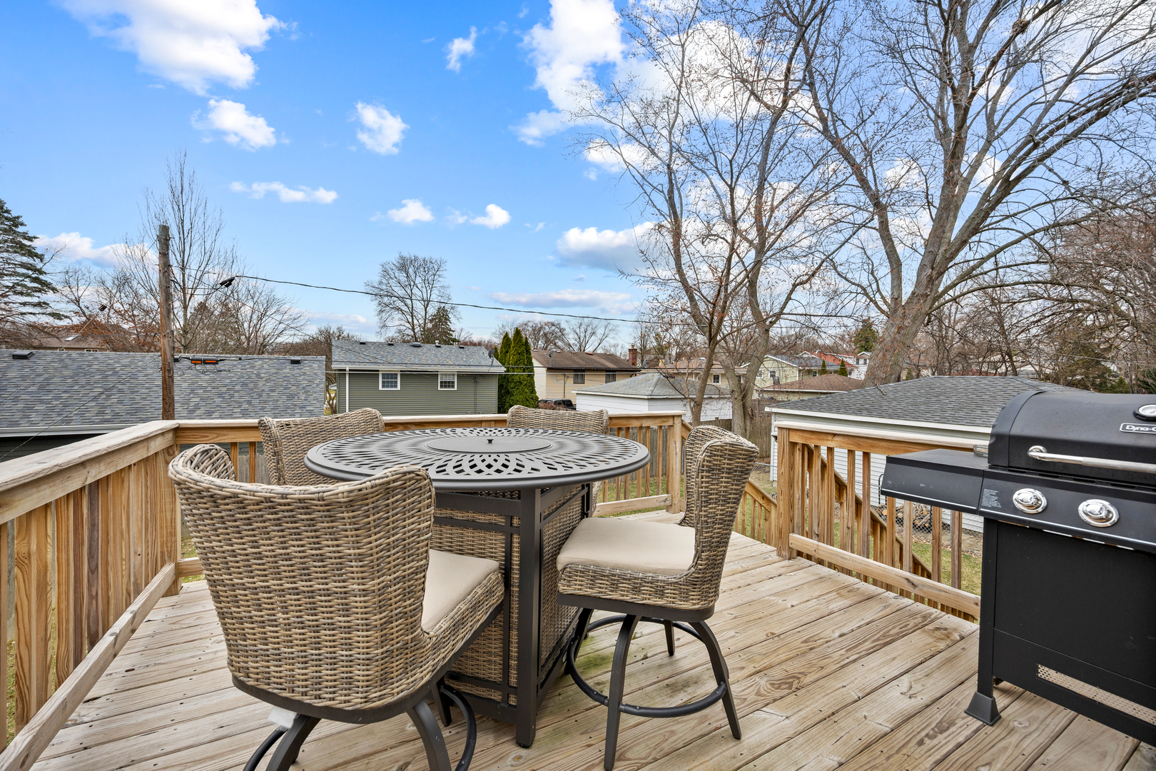 N112 Leonard Street Winfield, IL 60190 - Photo 5 of 26 a view of a chairs and table on the deck