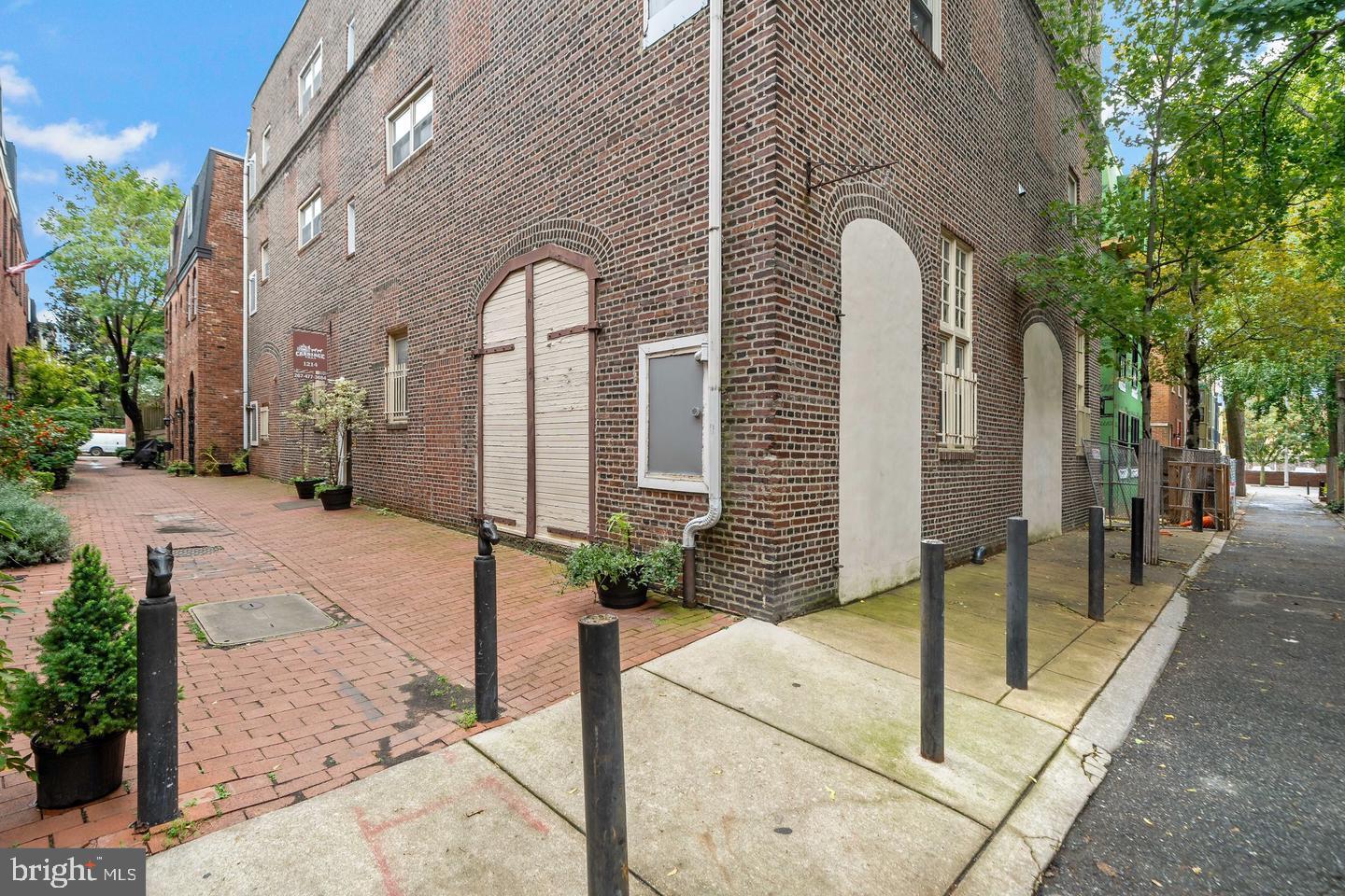 1214 Waverly Street, Unit 303 Philadelphia, PA 19147 - Photo 9 of 15 a front view of a building with street view