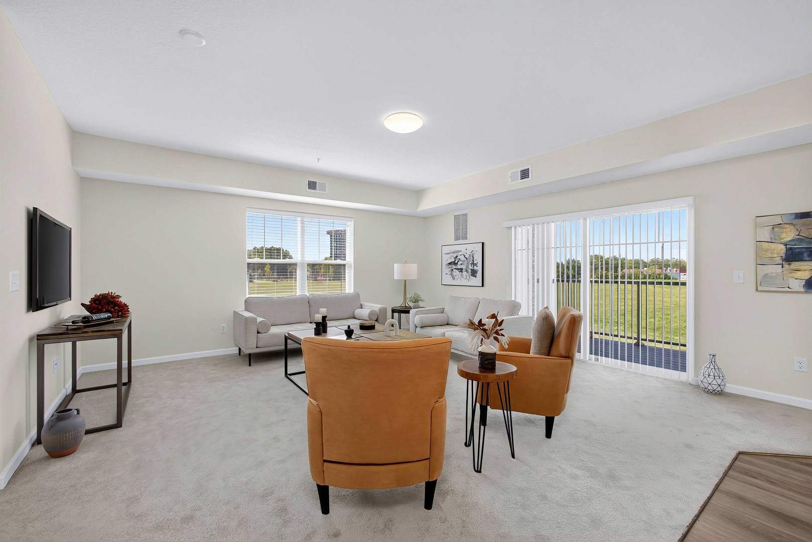 2592 Middle Road, Unit 202 Bettendorf, IA 52722 - Photo 12 of 50 a living room with furniture and a window