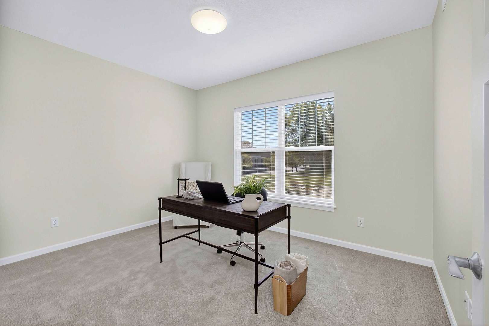 2592 Middle Road, Unit 202 Bettendorf, IA 52722 - Photo 19 of 50 a view of a workspace with a window