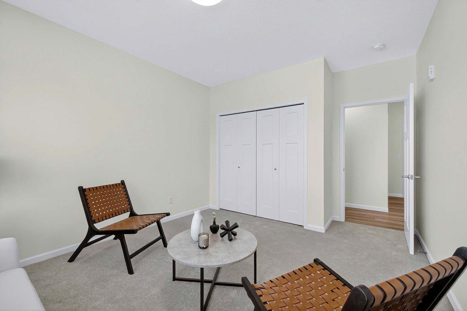 2592 Middle Road, Unit 202 Bettendorf, IA 52722 - Photo 23 of 50 a living room with furniture and a rug