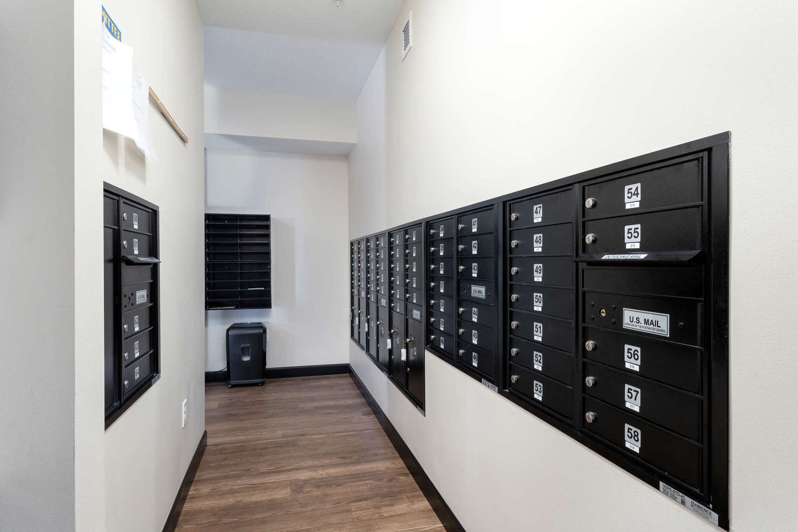 2592 Middle Road, Unit 202 Bettendorf, IA 52722 - Photo 48 of 50 a view of locker room with wooden floor