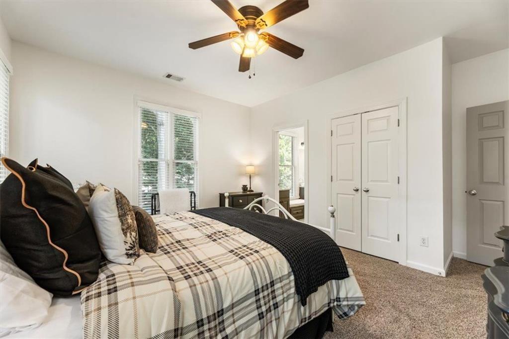 3910 Two Rivers Drive Cumming, GA 30041 - Photo 53 of 110 a bedroom with a bed and window