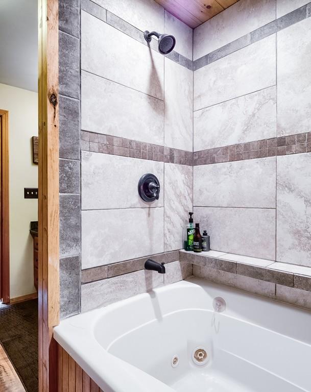 7 Mitchell Hill Road Brookfield, MA 01506 - Photo 27 of 38 a bathroom with a tub and a sink