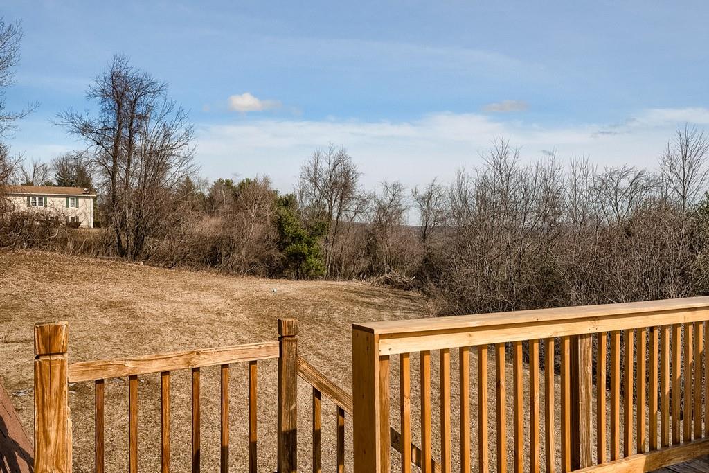7 Mitchell Hill Road Brookfield, MA 01506 - Photo 33 of 38 a view of a yard with wooden fence
