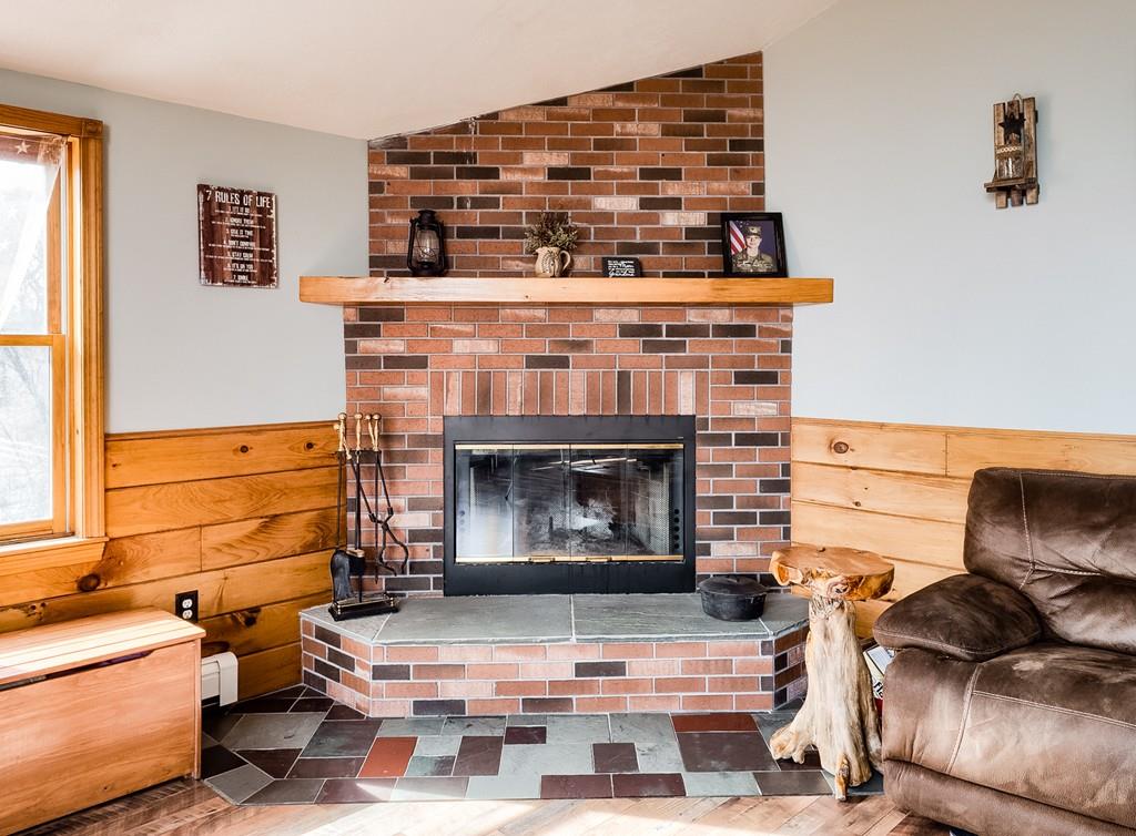 7 Mitchell Hill Road Brookfield, MA 01506 - Photo 4 of 38 a living room with furniture and a fireplace