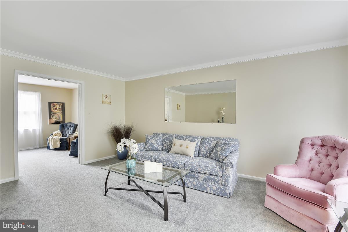 2313 Holly Spring Drive Silver Spring, MD 20905 - Photo 6 of 30 a living room with furniture and a couch