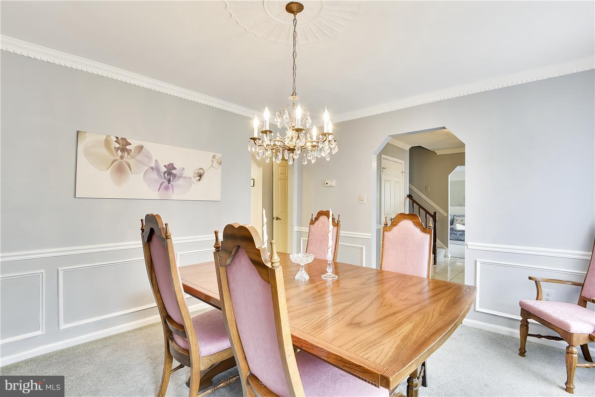 2313 Holly Spring Drive Silver Spring, MD 20905 - Photo 8 of 30 a dining room with furniture and window