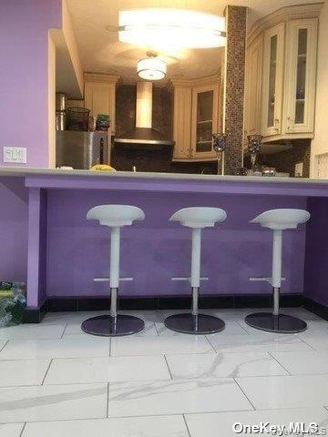 86-05 60th Road, Unit 3F Queens, NY 11373 - Photo 9 of 10 a bathroom with a sink and a mirror