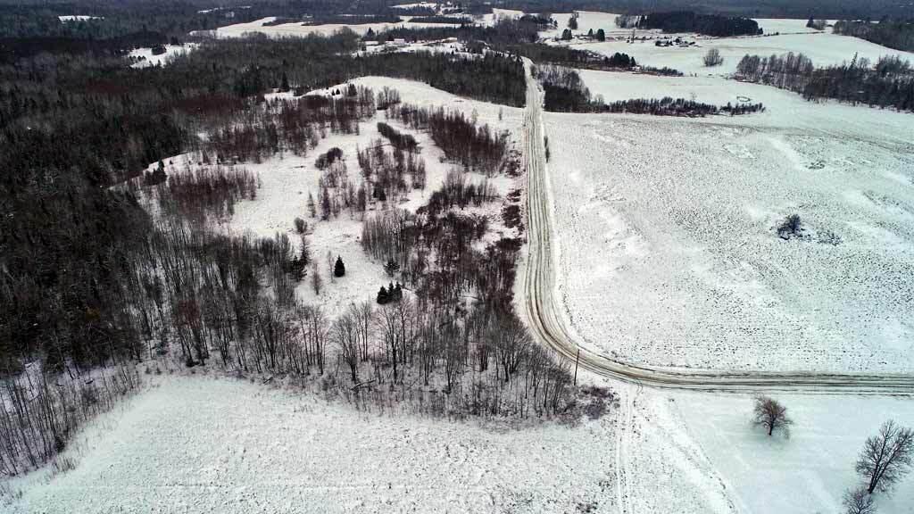 105 Curtis Road Monticello, ME 04760 - Photo 51 of 55 aerial-home-woods-land