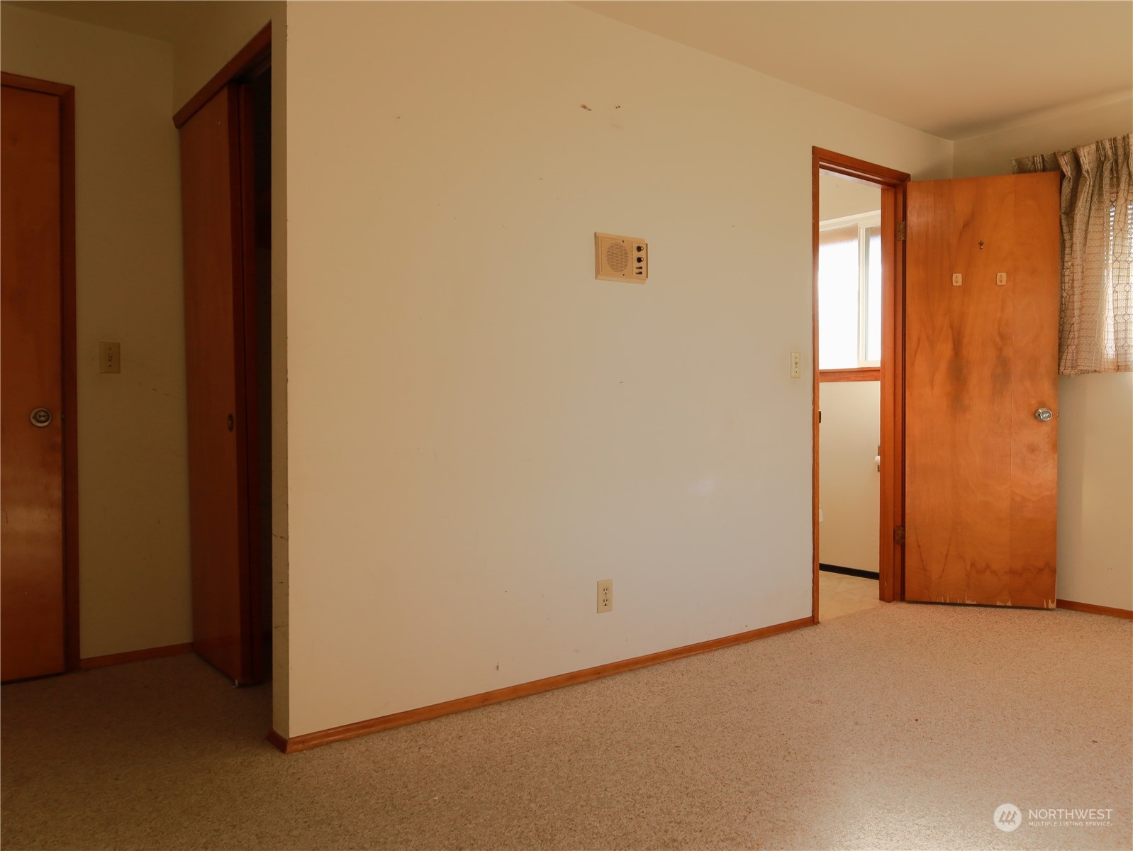 5150 South Creston Street Seattle, WA 98178 - Photo 11 of 27 a view of an empty room with a window