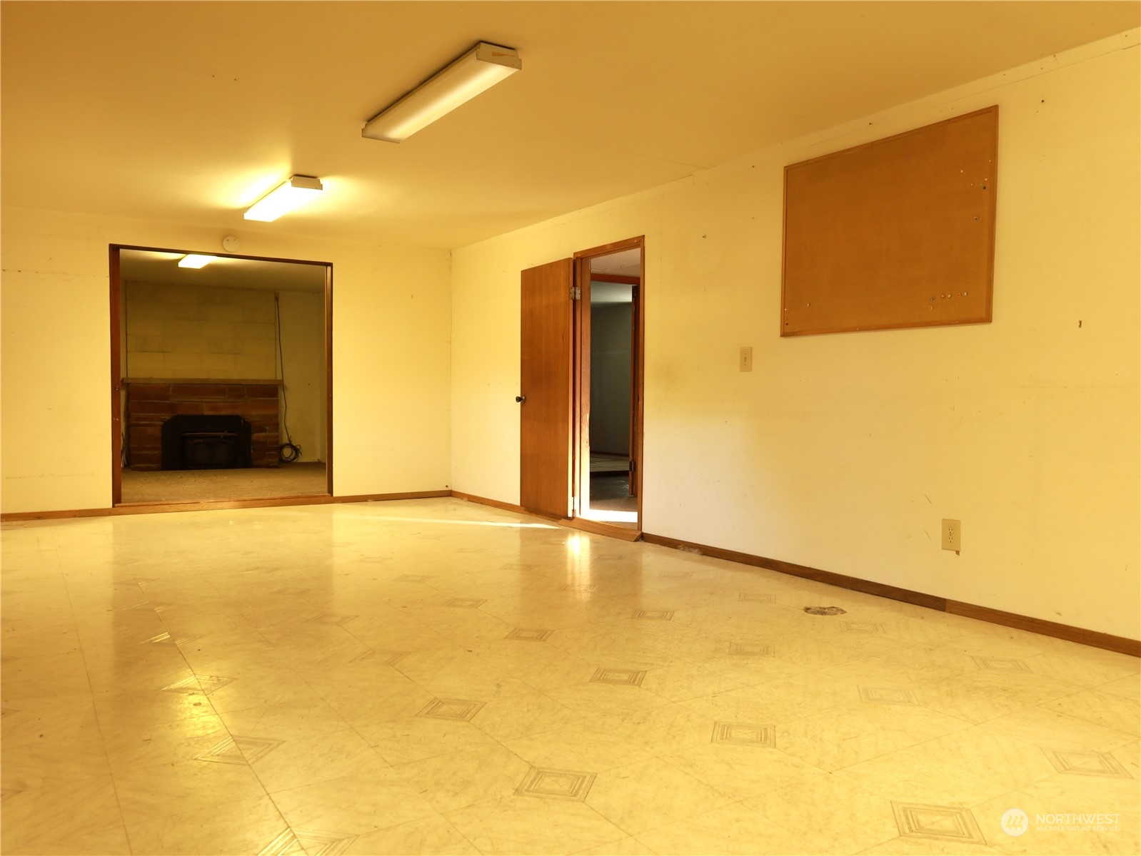 5150 South Creston Street Seattle, WA 98178 - Photo 21 of 27 a view of an empty room with a window