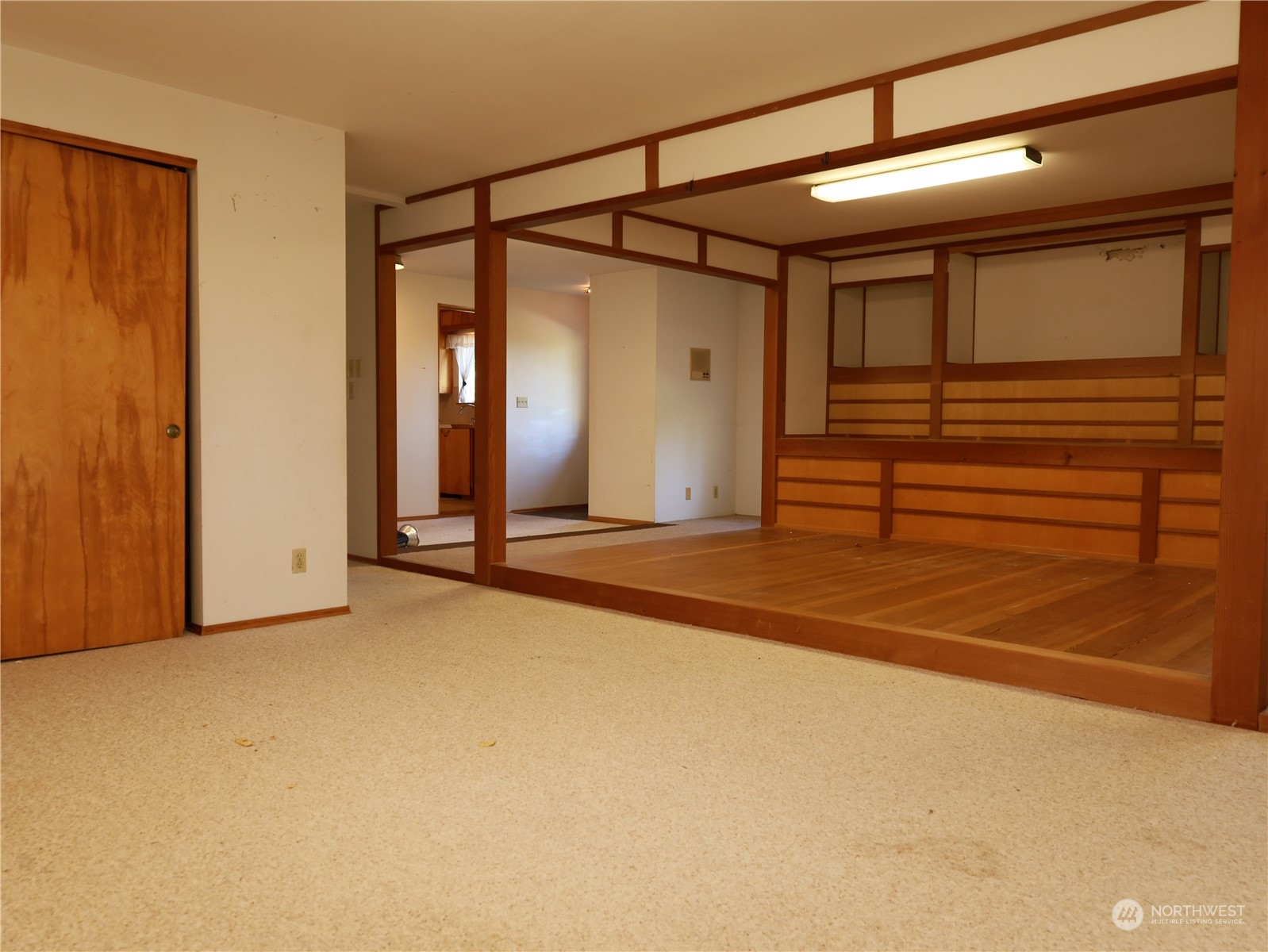 5150 South Creston Street Seattle, WA 98178 - Photo 6 of 27 a view of a room with wooden floor and windows