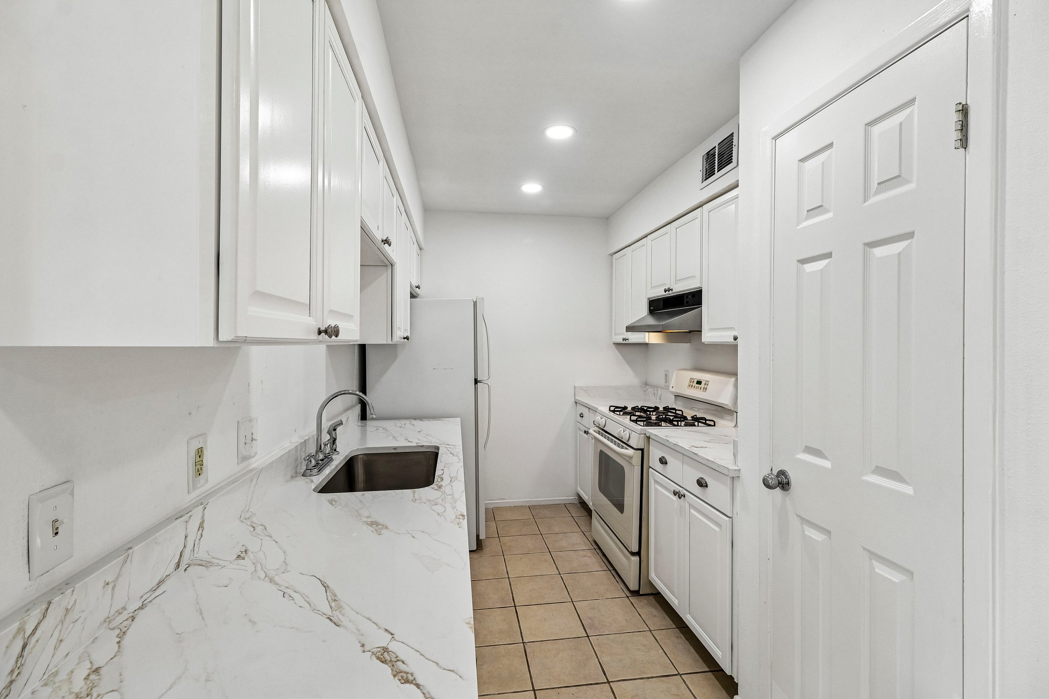 5809 Coventry Lane Austin, TX 78723 - Photo 4 of 35 Galley style kitchen featuring.