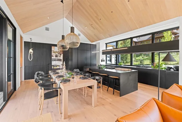 a dinning table and chairs in the balcony