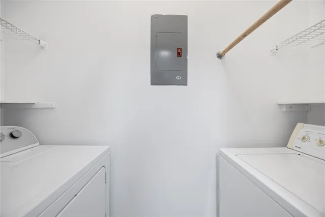 a utility room with dryer and washer