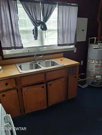 a view of a kitchen with utility room