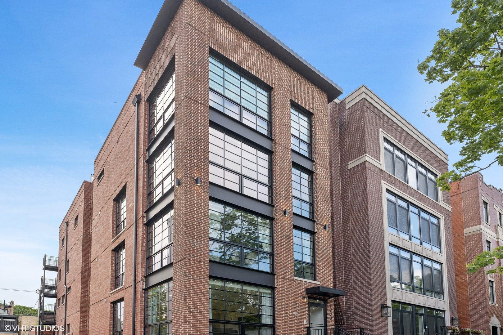1833 North Larrabee Street, Unit 1 Chicago, IL 60614 - Photo 1 of 32 a front view of a multi story building