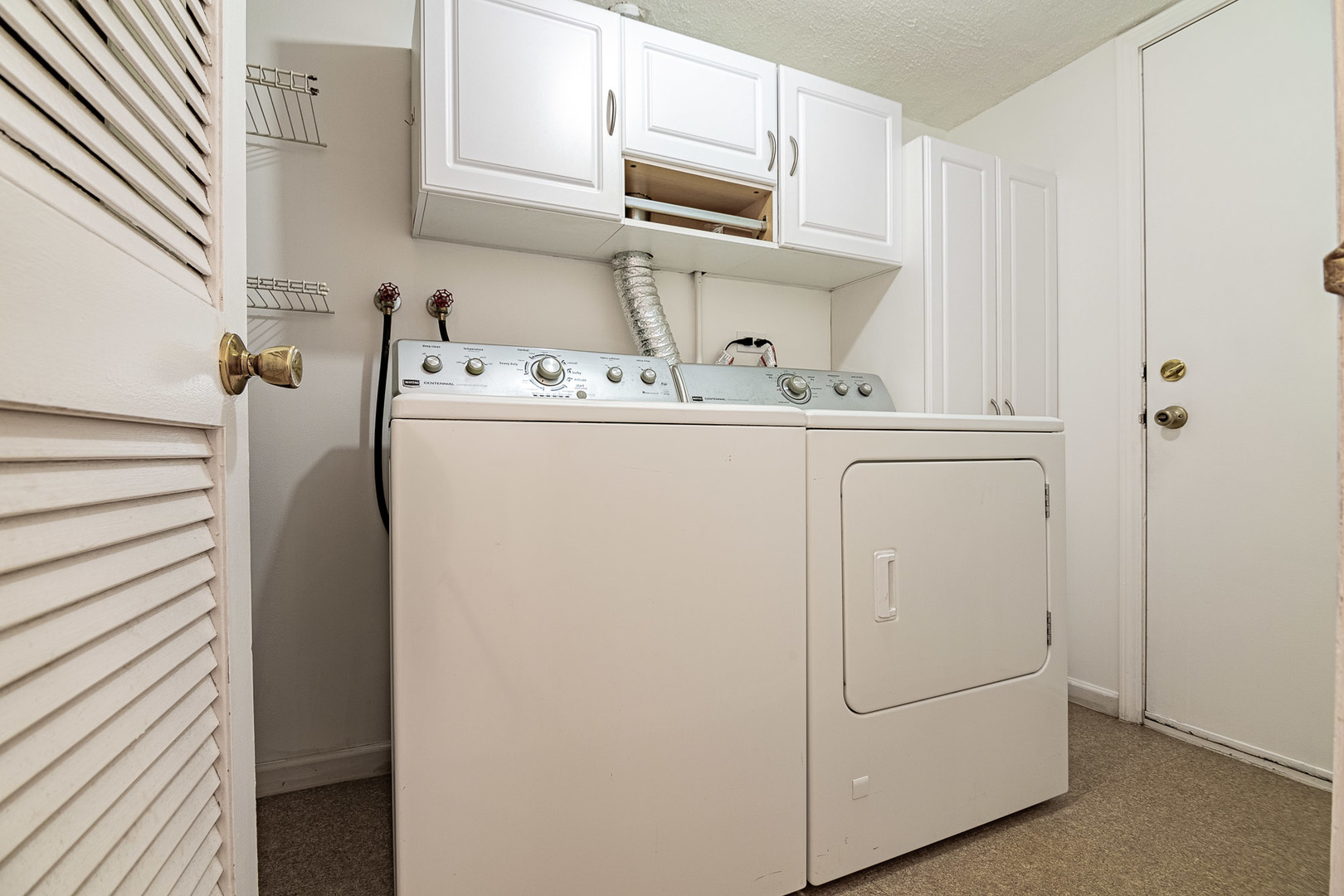 1279 Longacre Lane, Unit 1279 Wheeling, IL 60090 - Photo 11 of 14 a utility room with dryer and washer