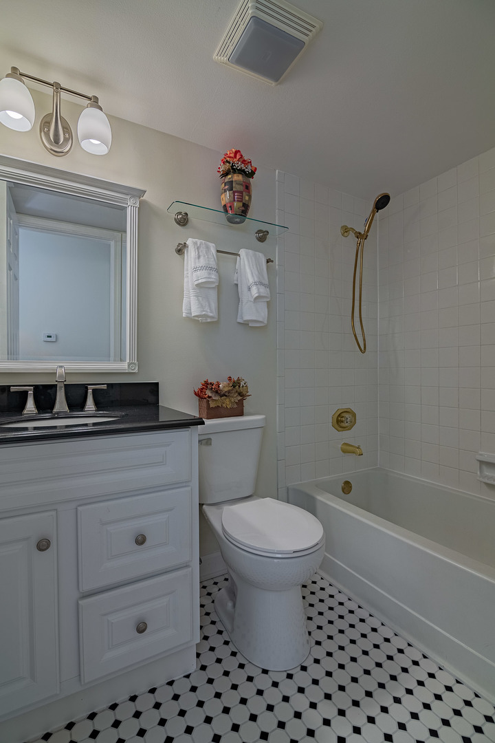 1279 Longacre Lane, Unit 1279 Wheeling, IL 60090 - Photo 8 of 14 a bathroom with a sink a toilet and shower