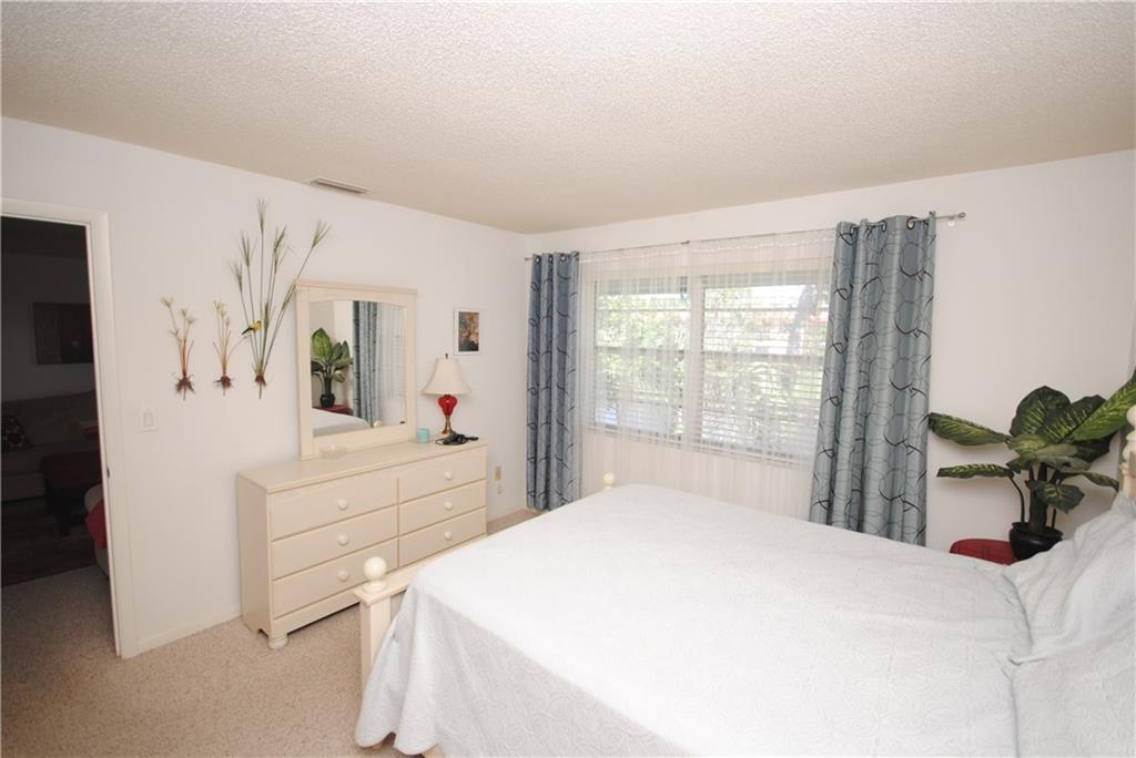 1997 Southwest Palm City Road, Unit I Stuart, FL 34994 - Photo 14 of 36 Master Bedroom