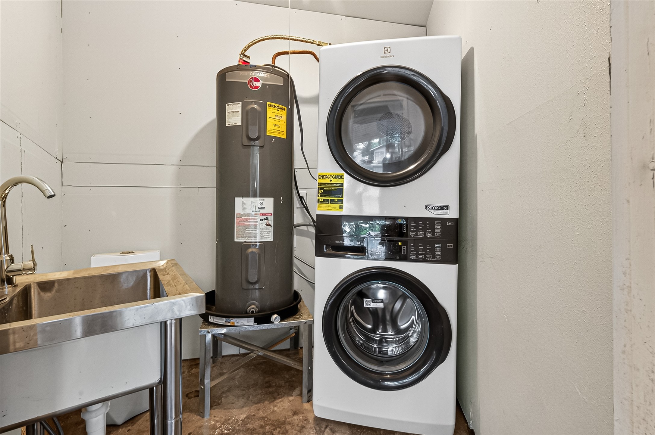 4628 Roseneath Drive, Unit A Houston, TX 77021 - Photo 13 of 21 Utility room has stacked full size brand new washer/dryer, sink, and toilet.