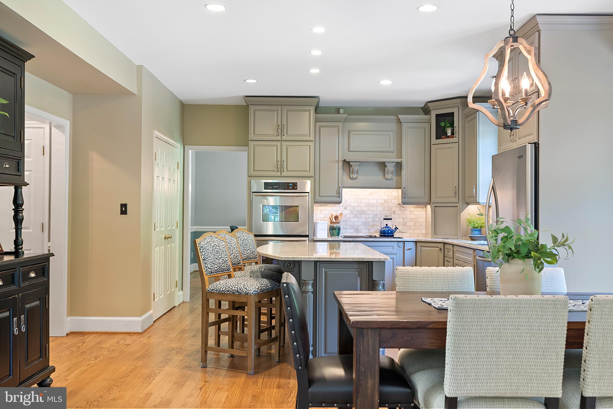 1600 Old Mill Bottom Run Annapolis, MD 21409 - Photo 15 of 56 a view of a dining room with furniture
