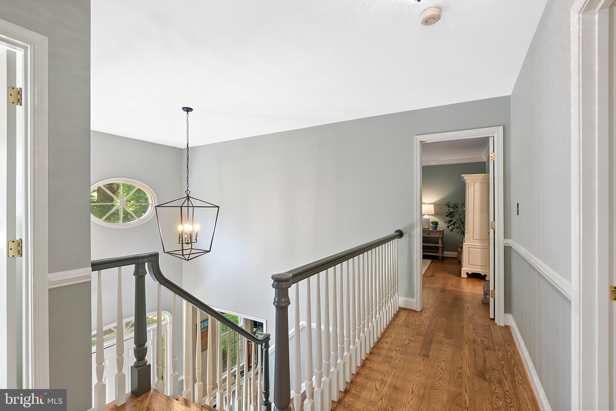 1600 Old Mill Bottom Run Annapolis, MD 21409 - Photo 22 of 56 a view of a hallway to a bedroom with wooden floor