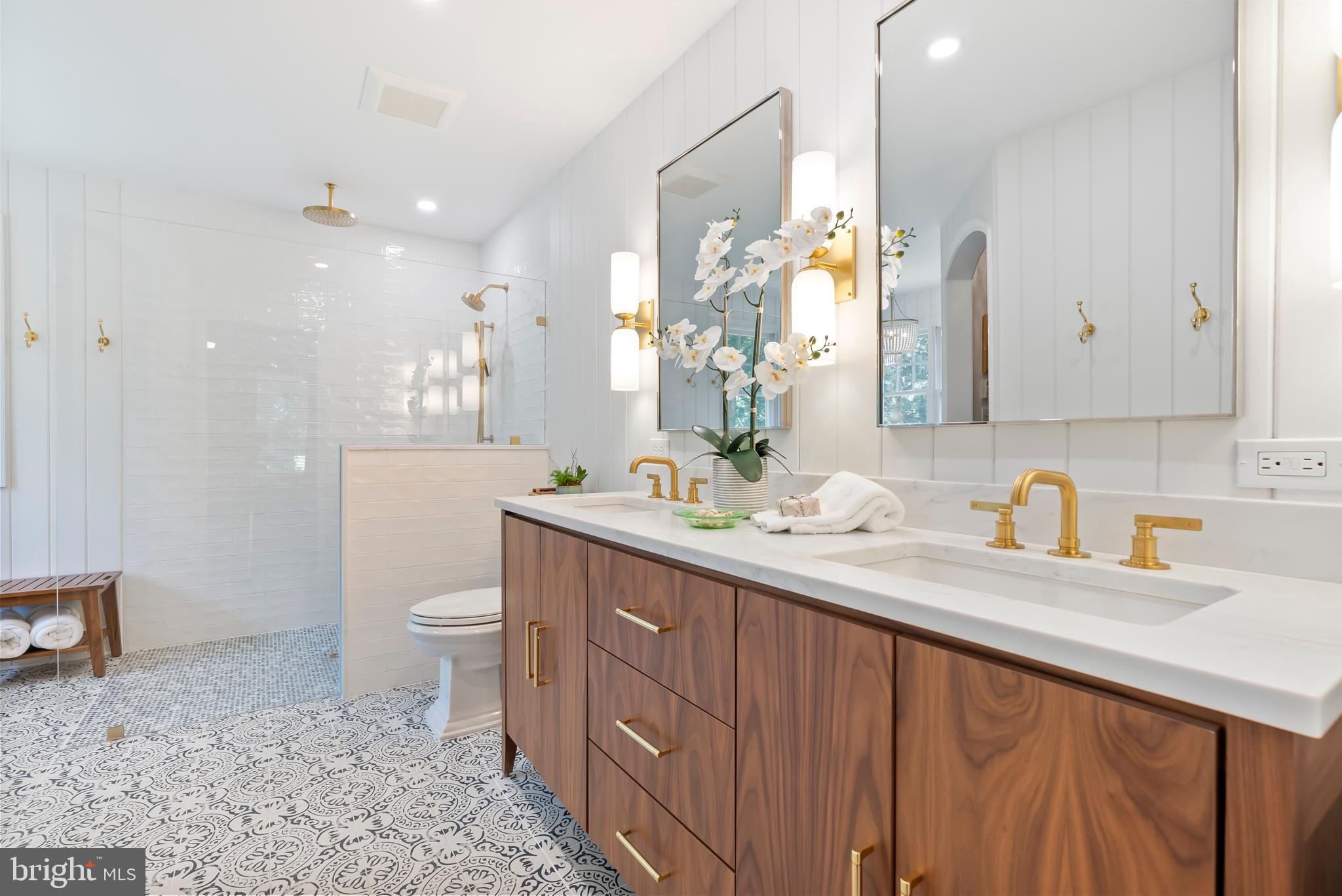 1600 Old Mill Bottom Run Annapolis, MD 21409 - Photo 25 of 56 a bathroom with a sink a toilet and a mirror