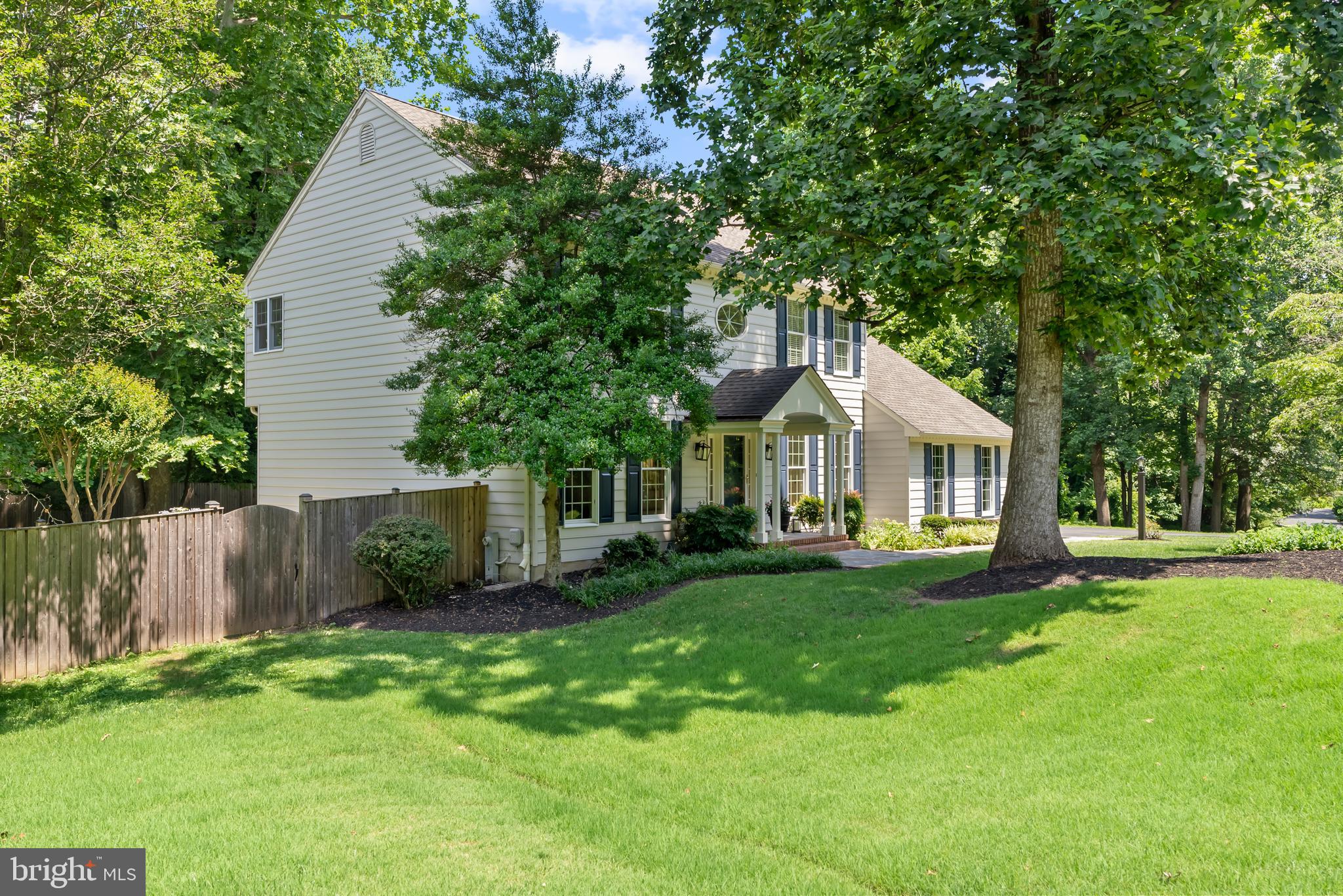 1600 Old Mill Bottom Run Annapolis, MD 21409 - Photo 3 of 56 a front view of a house with a garden and trees