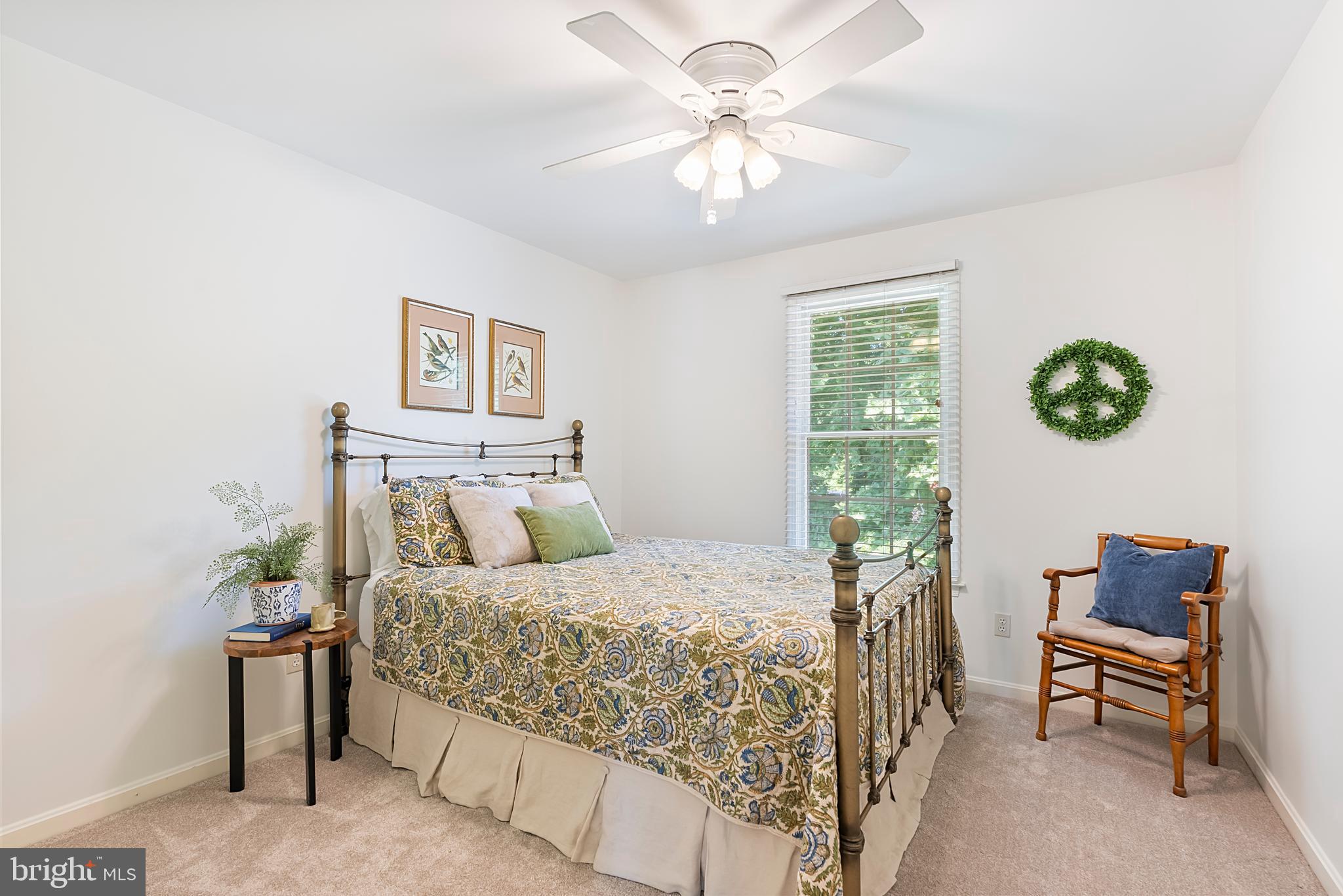 1600 Old Mill Bottom Run Annapolis, MD 21409 - Photo 31 of 56 a bedroom with a bed and a chandelier