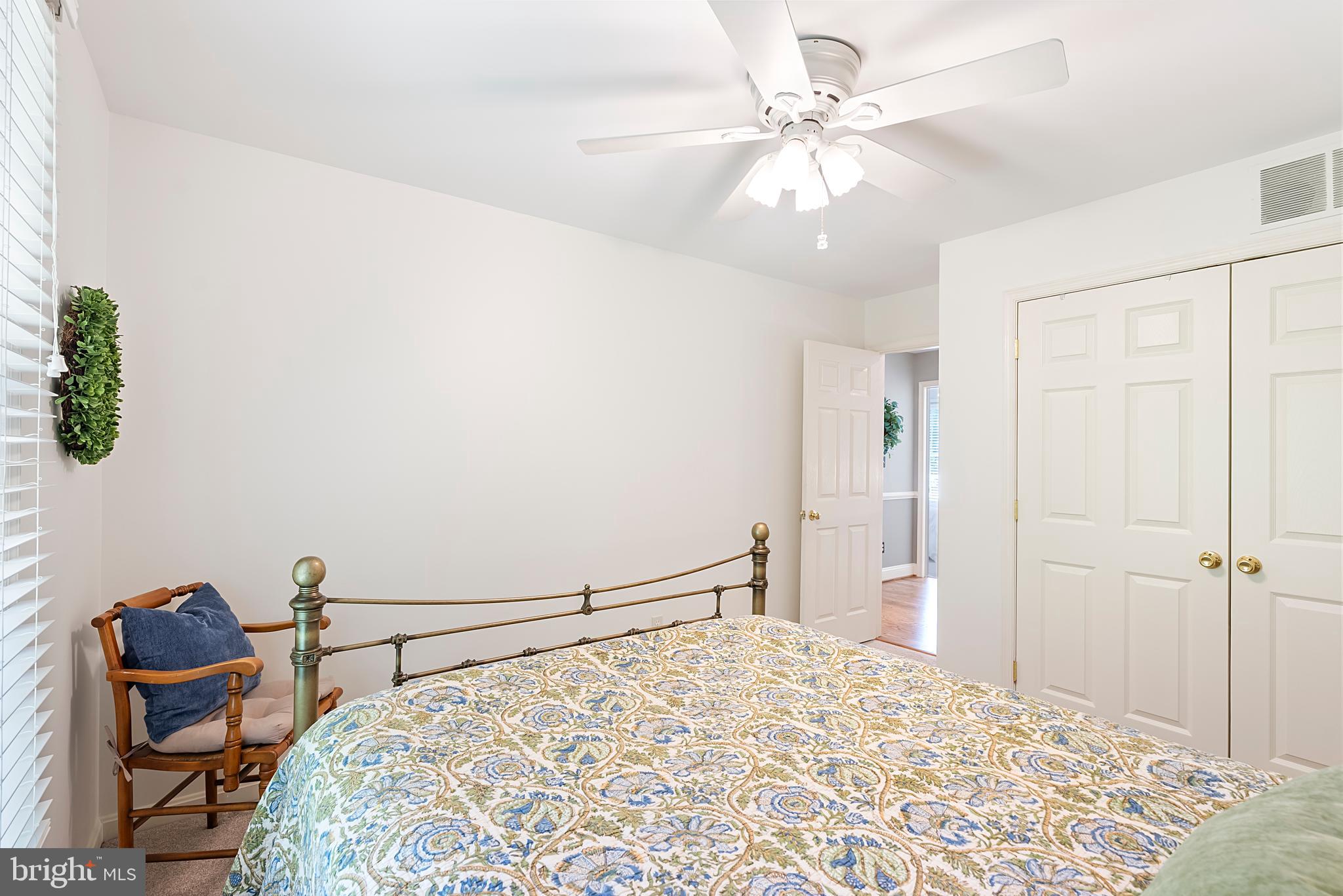 1600 Old Mill Bottom Run Annapolis, MD 21409 - Photo 32 of 56 a bedroom with a bed and a chandelier