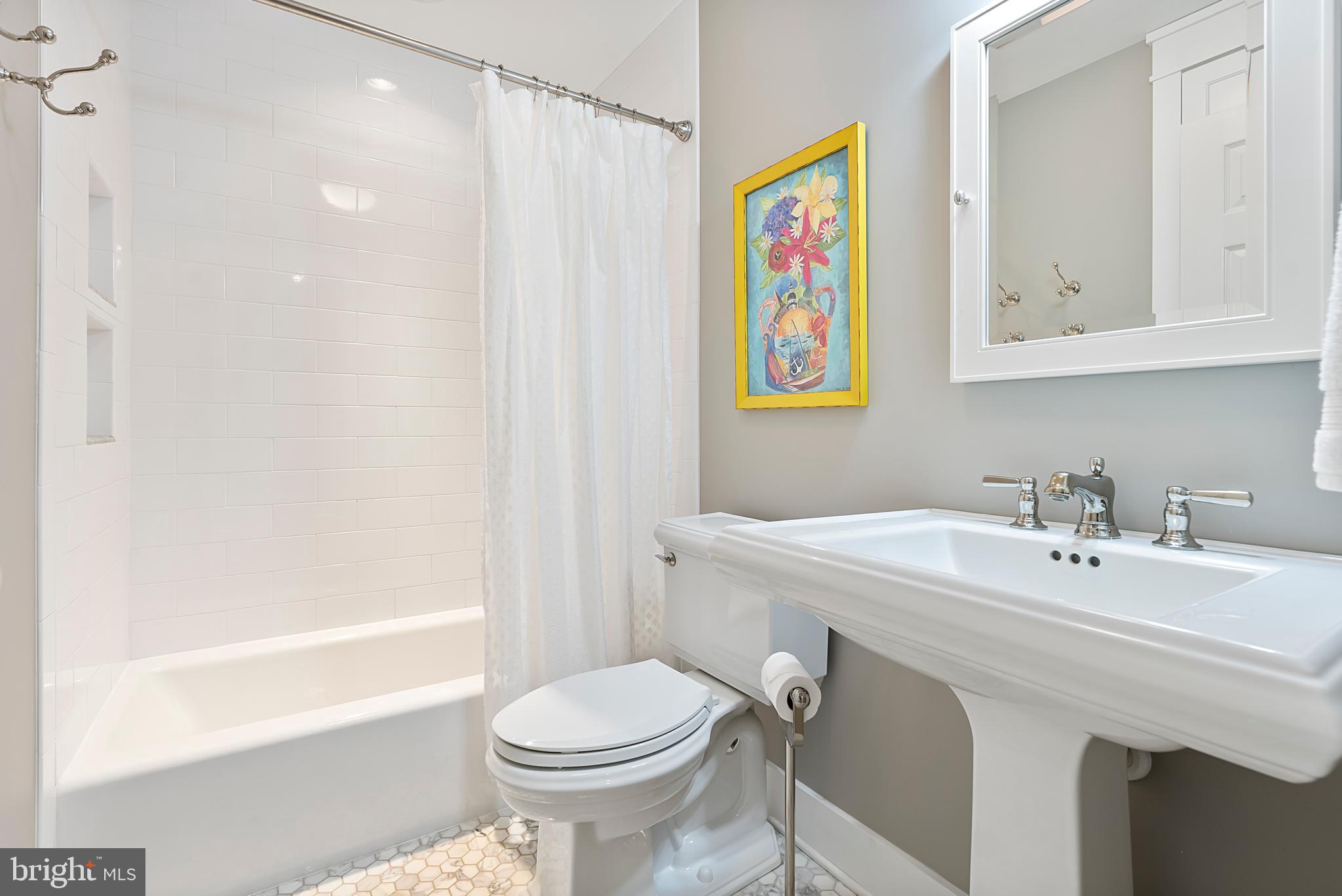 1600 Old Mill Bottom Run Annapolis, MD 21409 - Photo 35 of 56 a bathroom with a sink a toilet and shower