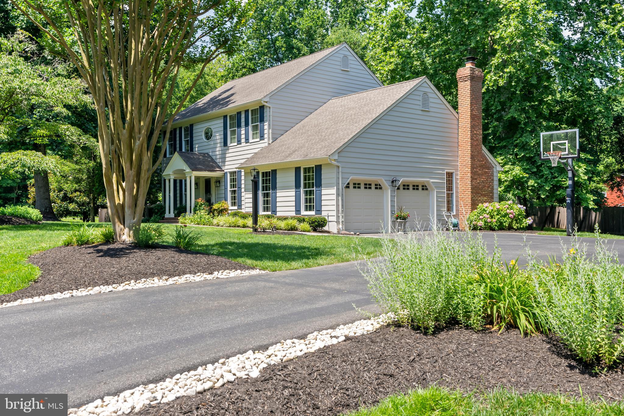 1600 Old Mill Bottom Run Annapolis, MD 21409 - Photo 4 of 56 a front view of a house with a garden