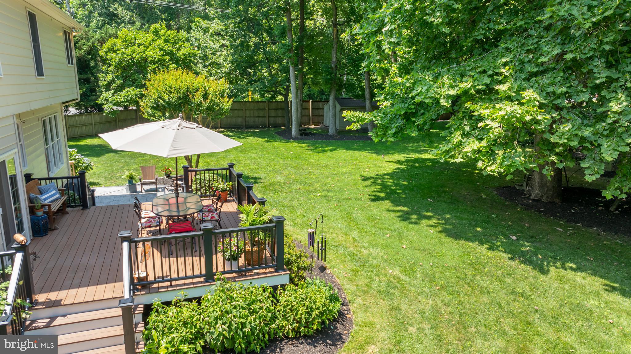 1600 Old Mill Bottom Run Annapolis, MD 21409 - Photo 41 of 56 a view of a table and chairs under an umbrella in the patio